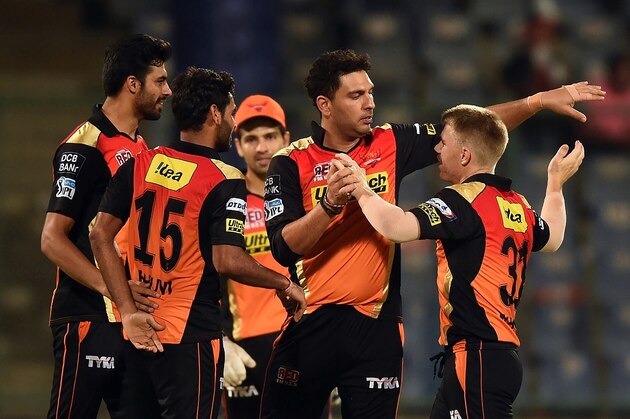 Sunrisers Hyderabad captain David Warner (R) celebrates the victory over Kolkata Knight Riders with teammates  during the 2016 Indian Premier League (IPL) Twenty20 eliminator cricket match between Kolkata Knight Riders and Sunrisers Hyderabad at the Feroz Shah Kotla Cricket Stadium in New Delhi on May 25, 2016. / AFP / PRAKASH SINGH        (Photo credit should read PRAKASH SINGH/AFP/Getty Images)