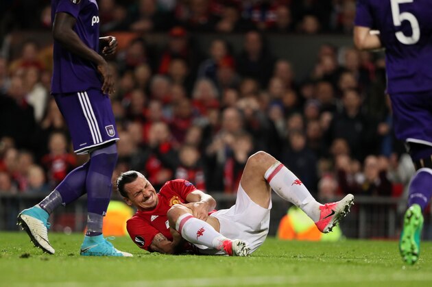 MANCHESTER, ENGLAND - APRIL 20:  Zlatan Ibrahimovic of Manchester United lies injured during the UEFA Europa League quarter final second leg match between Manchester United and RSC Anderlecht at Old Trafford on March 20, 2017 in Manchester, United Kingdom.  (Photo by Matthew Ashton - AMA/Getty Images)