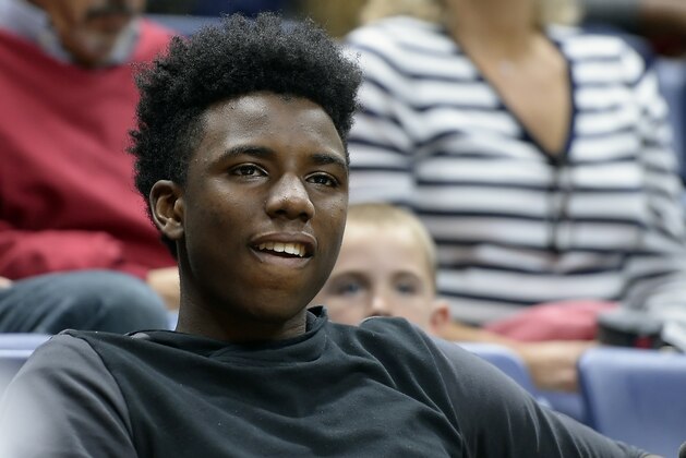 Hamidou Diallo, of New York, watches the UConn men's and women's NCAA basketball teams' First Night event, Friday, Oct. 14, 2016, in Storrs, Conn. Diallo is a 6-foot-5 shooting guard at Putnam Science Academy. (AP Photo/Jessica Hill)