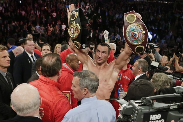 Wladimir Klitschko, of Ukraine, poses for fans after a heavyweight boxing match against Bryant Jennings, early Sunday, April 26, 2015, at Madison Square Garden in New York. Klitschko won the fight by unanimous decision. (AP Photo/Frank Franklin II)