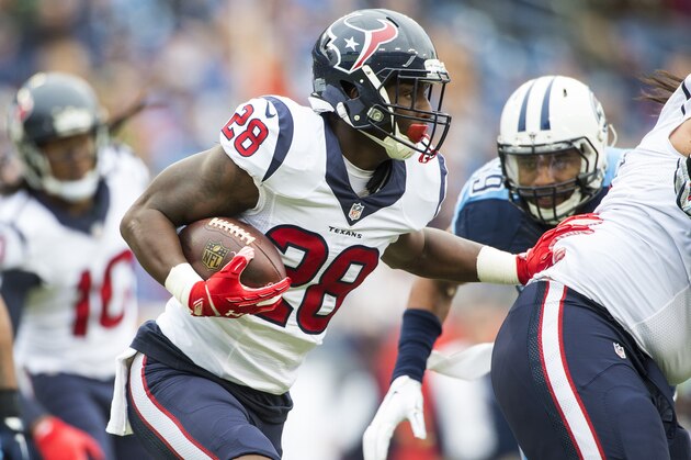 NASHVILLE, TN - JANUARY 01:  Running back Alfred Blue #28 of the Houston Texans carries the ball during a NFL game against the Tennessee Titans at Nissan Stadium on January 1, 2017 in Nashville, Tennessee.  (Photo by Ronald C. Modra/Sports Imagery/ Getty Images)