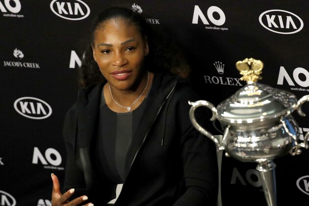 United States' Serena Williams answers questions at a press conference after defeating her sister Venus to win the women's singles final at the Australian Open tennis championships in Melbourne, Australia, Saturday, Jan. 28, 2017. (AP Photo/Kin Cheung)