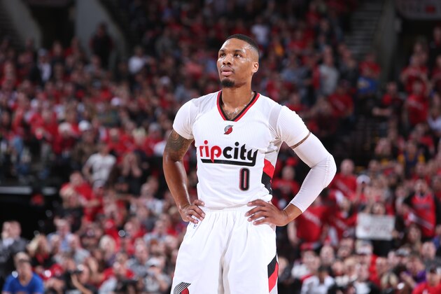 PORTLAND, OR - APRIL 22:  Damian Lillard #0 of the Portland Trail Blazers stands on the court against the Golden State Warriors in Game Three of the Western Conference Quarterfinals of the 2017 NBA Playoffs on April 22, 2017 at the Moda Center in Portland, Oregon. NOTE TO USER: User expressly acknowledges and agrees that, by downloading and or using this Photograph, user is consenting to the terms and conditions of the Getty Images License Agreement. Mandatory Copyright Notice: Copyright 2017 NBAE (Photo by Sam Forencich/NBAE via Getty Images)
