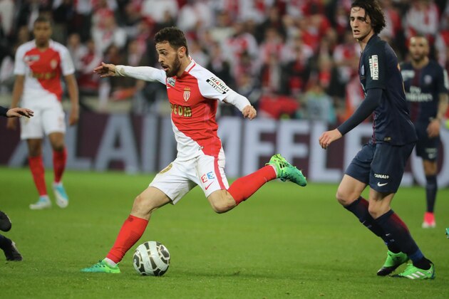 LYON, FRANCE - APRIL 01:  Bernardo Silva of AS Monaco in action with Adrien Rabiot of Paris Saint-Germain during the French League Cup Final match between Paris Saint-Germain and AS Monaco at Parc Olympique on  Japril 01, 2017 in Lyon, France.  (Photo by Xavier Laine/Getty Images)