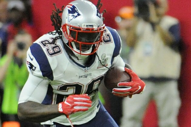 HOUSTON, TX - FEBRUARY 05:   LeGarrette Blount #29 of the New England Patriots carries the ball against the Atlanta Falcons during Super Bowl 51 at NRG Stadium on February 5, 2017 in Houston, Texas. The Patriots defeat the Atlanta Falcons 34-28 in overtime. (Photo by Focus on Sport/Getty Images)