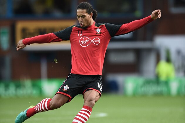 Southampton's Dutch defender Virgil van Dijk warms up ahead of the English Premier League football match between Burnley and Southampton at Turf Moor in Burnley, north west England on January 14, 2017. / AFP / Oli SCARFF / RESTRICTED TO EDITORIAL USE. No use with unauthorized audio, video, data, fixture lists, club/league logos or 'live' services. Online in-match use limited to 75 images, no video emulation. No use in betting, games or single club/league/player publications.  /         (Photo credit should read OLI SCARFF/AFP/Getty Images)