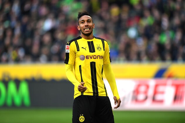 Dortmund's Gabonese striker Pierre-Emerick Aubameyang celebrate after scoring  during the German first division Bundesliga football match Borussia Moenchengladbach v BVB Borussia Dortmund  in Moenchengladbach, western Germany, on April 22, 2017. / AFP PHOTO / PATRIK STOLLARZ / RESTRICTIONS: DURING MATCH TIME: DFL RULES TO LIMIT THE ONLINE USAGE TO 15 PICTURES PER MATCH AND FORBID IMAGE SEQUENCES TO SIMULATE VIDEO. == RESTRICTED TO EDITORIAL USE == FOR FURTHER QUERIES PLEASE CONTACT DFL DIRECTLY AT + 49 69 650050
        (Photo credit should read PATRIK STOLLARZ/AFP/Getty Images)