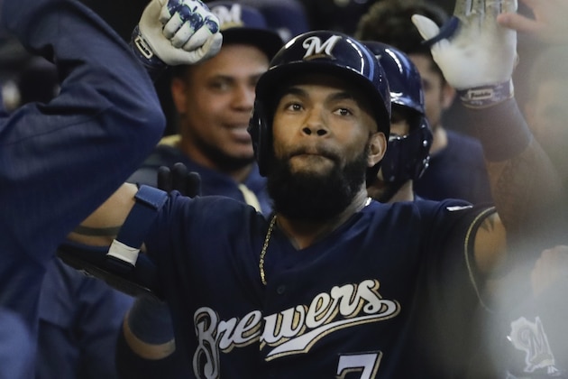 Milwaukee Brewers' Eric Thames celebrates his two-run home run during the second inning of a baseball game against the Cincinnati Reds Monday, April 24, 2017, in Milwaukee. (AP Photo/Morry Gash)