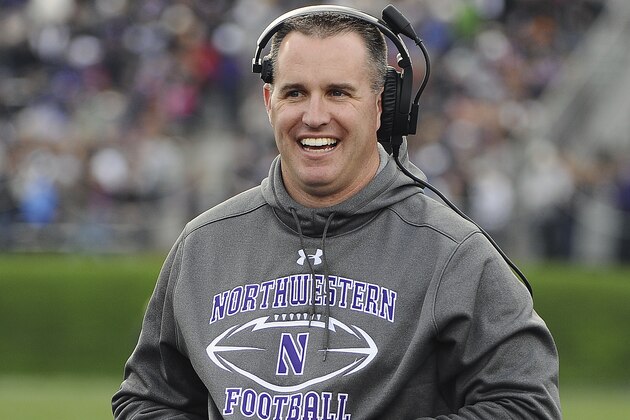 Northwestern head coach Pat Fitzgerald talks on the sidelines during an NCAA college football game against Penn State in Evanston, Ill.,  Saturday, Nov. 7, 2015. (AP Photo/Matt Marton)