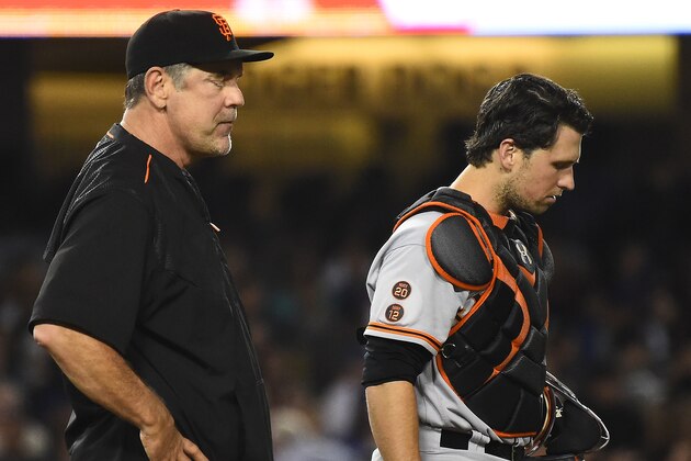 LOS ANGELES, CA - AUGUST 23:  Buster Posey #28 of the San Francisco Giants and manager Bruce Bochy #15 wait on the mound for a new pitcher in the sixth inning of the game against the Los Angeles Dodgers at Dodger Stadium on August 23, 2016 in Los Angeles, California. (Photo by Jayne Kamin-Oncea/Getty Images)