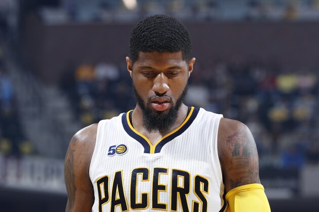 INDIANAPOLIS, IN - APRIL 23: Paul George #13 of the Indiana Pacers reacts against the Cleveland Cavaliers in Game Four of the Eastern Conference Quarterfinals during the 2017 NBA Playoffs at Bankers Life Fieldhouse on April 23, 2017 in Indianapolis, Indiana. The Cavaliers defeated the Pacers 106-102 to sweep the series 4-0. NOTE TO USER: User expressly acknowledges and agrees that, by downloading and or using the photograph, User is consenting to the terms and conditions of the Getty Images License Agreement. (Photo by Joe Robbins/Getty Images)