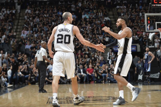 SAN ANTONIO, TX - APRIL 25:  Manu Ginobili #20 and Patty Mills #8 of the San Antonio Spurs react to a play during Game Five of the Western Conference Quarterfinals of the 2017 NBA Playoffs on April 25, 2017 at AT&T Center in San Antonio, Texas. NOTE TO USER: User expressly acknowledges and agrees that, by downloading and/or using this photograph, user is consenting to the terms and conditions of the Getty Images License Agreement. Mandatory Copyright Notice: Copyright 2017 NBAE (Photo by Mark Sobhani/NBAE via Getty Images)