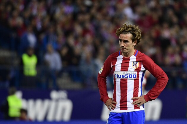 Atletico Madrid's French forward Antoine Griezmann stands on the pitch during the Spanish league football match Club Atletico de Madrid vs Villarreal CF at the Vicente Calderon stadium in Madrid on April 25, 2017. / AFP PHOTO / PIERRE-PHILIPPE MARCOU        (Photo credit should read PIERRE-PHILIPPE MARCOU/AFP/Getty Images)