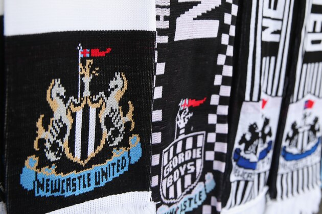 BIRMINGHAM, ENGLAND - SEPTEMBER 14:  Match day scarves on sale outside the Villa Park stadium prior to the Barclays Premier League match between Aston Villa and Newcastle United at Villa Park on September 14, 2013 in Birmingham, England.  (Photo by Mark Thompson/Getty Images)