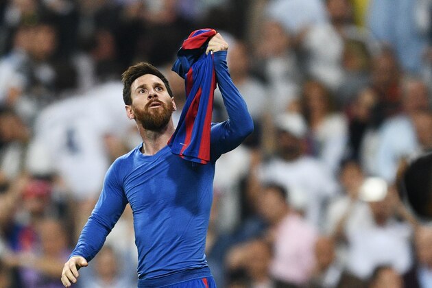 MADRID, SPAIN - APRIL 23:  Lionel Messi of Barcelona celebrates as he scores their third goal during the La Liga match between Real Madrid CF and FC Barcelona at Estadio Bernabeu on April 23, 2017 in Madrid, Spain.  (Photo by David Ramos/Getty Images)