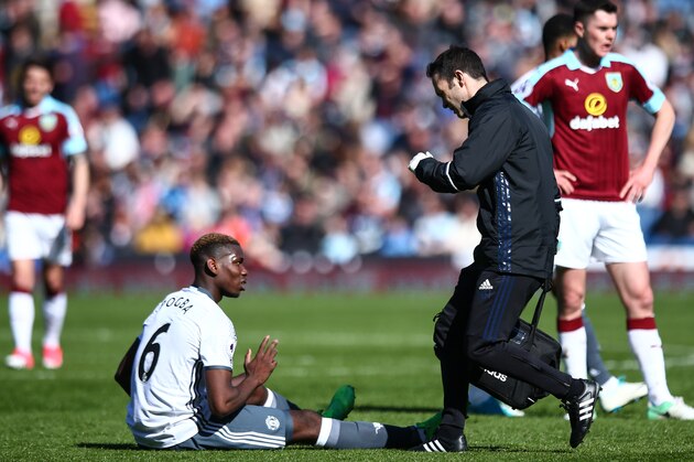 BURNLEY, ENGLAND - APRIL 23: Paul Pogba of Manchester United down injured during the Premier League match between Burnley and Manchester United at Turf Moor on April 23, 2017 in Burnley, England. (Photo by Robbie Jay Barratt - AMA/Getty Images)