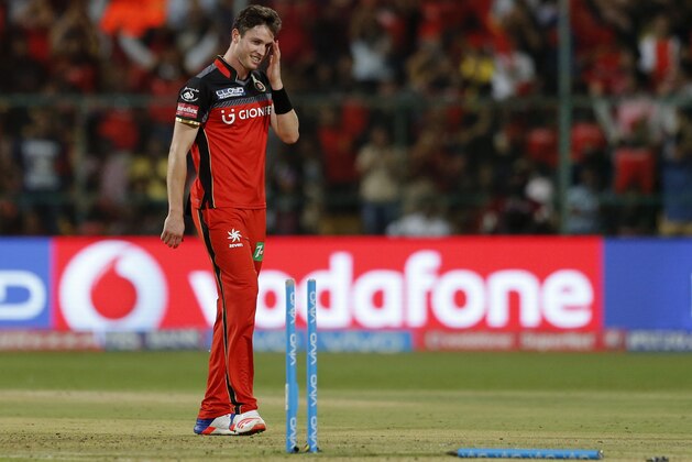 Royal Challengers Bangalore bowler Adam Milne reacts after bowling out Rising Pune Supergiants Ben Stokes during their Indian Premier League (IPL) cricket match in Bangalore, India, Sunday, April 16, 2017. (AP Photo/Aijaz Rahi)