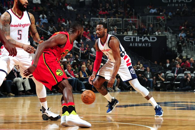 WASHINGTON, DC -  APRIL 26: John Wall #2 of the Washington Wizards handles the ball during the game against the Atlanta Hawks in Game Five of the Eastern Conference Quarterfinals of the 2017 NBA Playoffs on April 26, 2017 at Verizon Center in Washington, DC. NOTE TO USER: User expressly acknowledges and agrees that, by downloading and or using this Photograph, user is consenting to the terms and conditions of the Getty Images License Agreement. Mandatory Copyright Notice: Copyright 2017 NBAE (Photo by Scott Cunningham/NBAE via Getty Images)