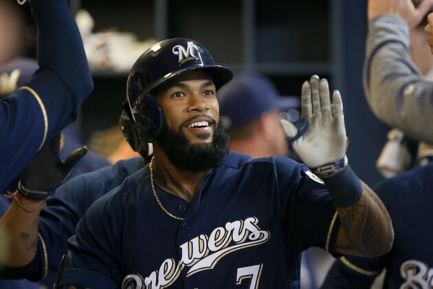 MILWAUKEE, WI - APRIL 25:  Eric Thames #7 of the Milwaukee Brewers celebrates with teammates after hitting a home run in the sixth inning against the Cincinnati Reds at Miller Park on April 25, 2017 in Milwaukee, Wisconsin. (Photo by Dylan Buell/Getty Images)