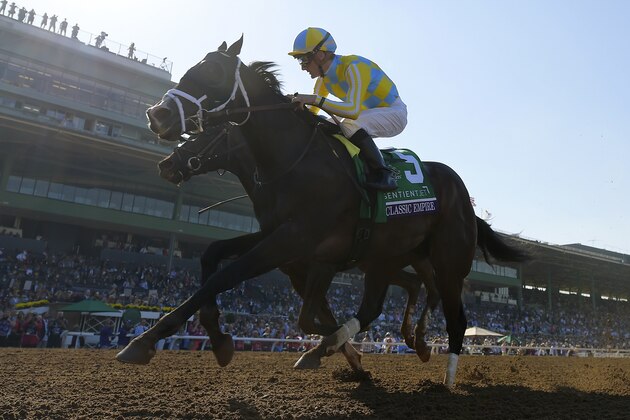 CORRECTS JOCKEY'S LAST NAME TO LEPAROUX, INSTEAD OF VELASQUEZ - Classic Empire, with jockey Julien Leparoux, wins the Breeders' Cup Juvenile horse race at Santa Anita, Saturday, Nov. 5, 2016, in Arcadia, Calif. (AP Photo/Mark J. Terrill)