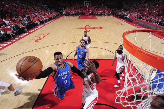 HOUSTON, TX - APRIL 25: Russell Westbrook #0 of the Oklahoma City Thunder goes to the basket against the Houston Rockets in Game Five of the Western Conference Quarterfinals of the 2017 NBA Playoffs on April 25, 2017 at the Toyota Center in Houston, Texas. NOTE TO USER: User expressly acknowledges and agrees that, by downloading and or using this photograph, User is consenting to the terms and conditions of the Getty Images License Agreement. Mandatory Copyright Notice: Copyright 2017 NBAE (Photo by Bill Baptist/NBAE via Getty Images)
