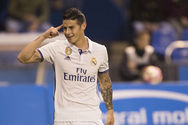 Real Madrid's James Rodriguez reacts after scoring a goal during a Spanish La Liga soccer match between Deportivo La Coruna and Real Madrid at the Riazor stadium in A Coruna, Spain, Wednesday April 26, 2017. (AP Photo/Lalo R. Villar)