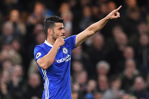 Chelsea's Brazilian-born Spanish striker Diego Costa celebrates after scoring their third goal during the English Premier League football match between Chelsea and Southampton at Stamford Bridge in London on April 25, 2017. / AFP PHOTO / Justin TALLIS / RESTRICTED TO EDITORIAL USE. No use with unauthorized audio, video, data, fixture lists, club/league logos or 'live' services. Online in-match use limited to 75 images, no video emulation. No use in betting, games or single club/league/player publications.  /         (Photo credit should read JUSTIN TALLIS/AFP/Getty Images)