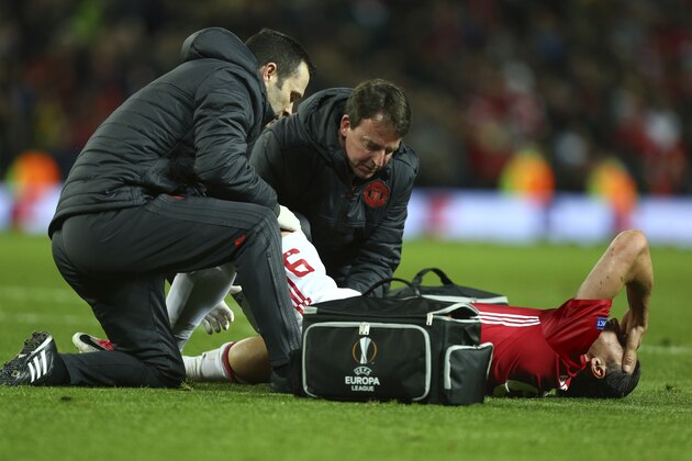 FILE - In this Thursday, April 20, 2017 file photo, Manchester United's Zlatan Ibrahimovic is checked before being taken off with an injury during the Europa League quarterfinal second leg soccer match between Manchester United and Anderlecht at Old Trafford stadium, in Manchester, England. Ibrahimovic is certain his illustrious career will not be ended by the serious knee injury that has cut short a fine first season at Manchester United. (AP Photo/Dave Thompson, File)