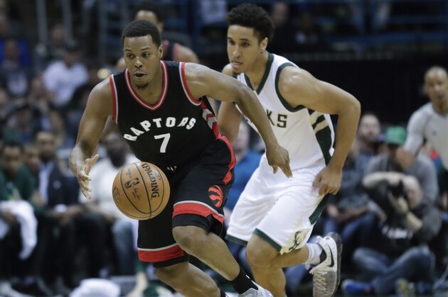 Toronto Raptors' Kyle Lowry steals the ball from Milwaukee Bucks' Malcolm Brogdon during the first half of Game 4 of an NBA first-round playoff series basketball game Saturday, April 22, 2017, in Milwaukee. (AP Photo/Morry Gash)