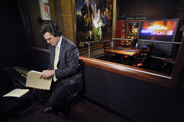 In this Tuesday, April 7, 2009 photo, football draft analyst Mel Kiper Jr prepares for a taping at the ESPN Zone in Baltimore. Saturday marks the 25th anniversary of Kiper's 1984 debut on ESPN's draft coverage, and while his demeanor and hair haven't changed all that much, his popularity certainly has. (AP Photo/Gail Burton)