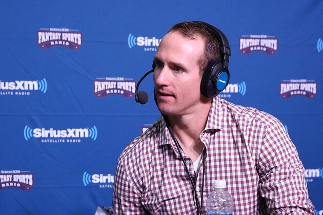 HOUSTON, TX - FEBRUARY 02:  New Orleans Saints quarterback Drew Brees, right, visits the SiriusXM set at Super Bowl 51 Radio Row at the George R. Brown Convention Center on February 2, 2017 in Houston, Texas.  (Photo by Cindy Ord/Getty Images for SiriusXM)
