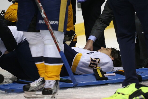 ST. LOUIS, MO - APRIL 26:  Kevin Fiala #56 of the Nashville Predators lies on the ice after being injured against the St. Louis Blues in Game One of the Western Conference Second Round during the 2017 NHL Stanley Cup Playoffs at the Scottrade Center on April 26, 2017 in St. Louis, Missouri.  (Photo by Dilip Vishwanat/Getty Images)