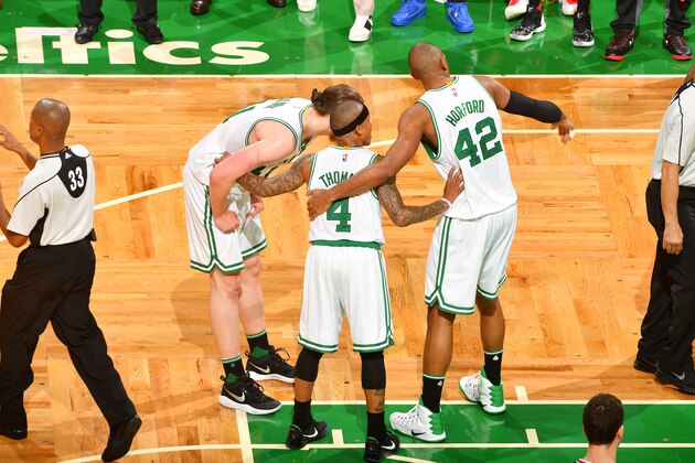 BOSTON, MA - APRIL 26: Kelly Olynyk #41, Isaiah Thomas #4 and Al Horford #42 of the Boston Celtics huddle up during the game against the Chicago Bulls in Game Five of the Eastern Conference Quarterfinals of the 2017 NBA Playoffs on April 26, 2017 at TD Garden in Boston, Massachusetts. NOTE TO USER: User expressly acknowledges and agrees that, by downloading and or using this Photograph, user is consenting to the terms and conditions of the Getty Images License Agreement. Mandatory Copyright Notice: Copyright 2017 NBAE (Photo by Jesse D. Garrabrant/NBAE via Getty Images)