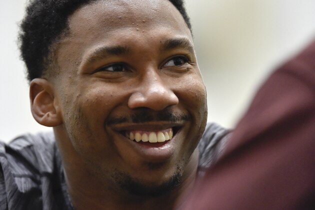 Former Texas A&M defensive end Myles Garrett smiles during Texas A&M NFL Pro Day at the NCAA football team's indoor training facility, Thursday, Match 30, 2017, in College Station, Texas.  (AP Photo/Eric Christian Smith)