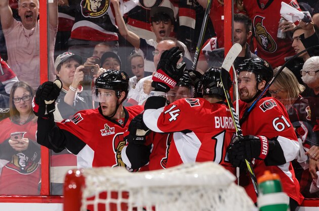 OTTAWA, ON - APRIL 27:  Ryan Dzingel #18 of the Ottawa Senators celebrates his second period power-play goal against the New York Rangers with teammates Kyle Turris #7, Alexandre Burrows #14 and Mark Stone #61 in Game One of the Eastern Conference Second Round during the 2017 NHL Stanley Cup Playoffs at Canadian Tire Centre on April 27, 2017 in Ottawa, Ontario, Canada.  (Photo by Jana Chytilova/Freestyle Photography/Getty Images)