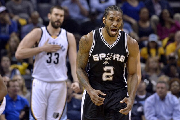 San Antonio Spurs forward Kawhi Leonard (2) and Memphis Grizzlies center Marc Gasol (33) react during the first half of Game 6 in an NBA basketball first-round playoff series Thursday, April 27, 2017, in Memphis, Tenn. (AP Photo/Brandon Dill)