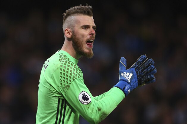 Manchester United's goalkeeper David de Gea reacts during the English Premier League soccer match between Manchester City and Manchester United at the Etihad Stadium in Manchester, England,Thursday, April 27, 2017.(AP Photo/Dave Thompson)