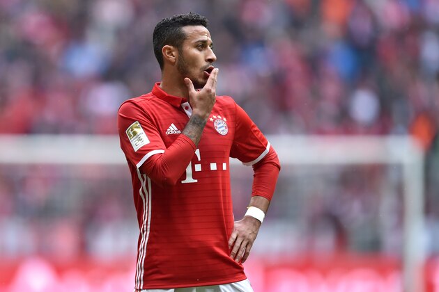Bayern Munich's Spanish midfielder Thiago Alcantara reacts during the German first division Bundesliga football match between FC Bayern Munich and Mainz 05 in Munich, southern Germany, on April 22, 2017. / AFP PHOTO / Christof STACHE / RESTRICTIONS: DURING MATCH TIME: DFL RULES TO LIMIT THE ONLINE USAGE TO 15 PICTURES PER MATCH AND FORBID IMAGE SEQUENCES TO SIMULATE VIDEO. == RESTRICTED TO EDITORIAL USE == FOR FURTHER QUERIES PLEASE CONTACT DFL DIRECTLY AT + 49 69 650050         (Photo credit should read CHRISTOF STACHE/AFP/Getty Images)