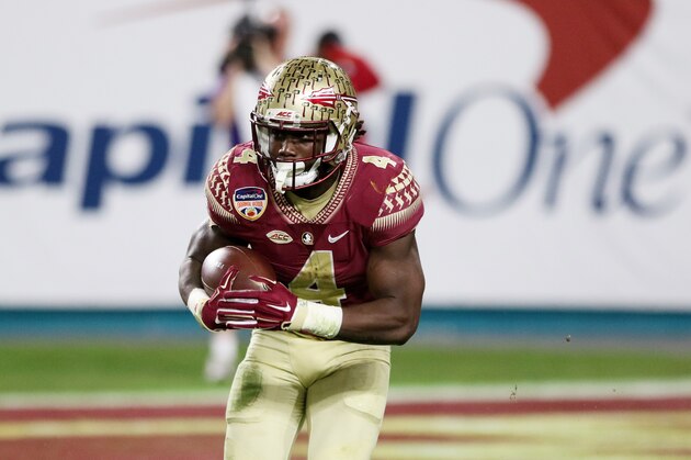 MIAMI GARDENS, FL - DECEMBER 30:  Dalvin Cook #4 of the Florida State Seminoles carries the ball in the second half against the Michigan Wolverines during the Capitol One Orange Bowl at Sun Life Stadium on December 30, 2016 in Miami Gardens, Florida.  (Photo by Marc Serota/Getty Images)