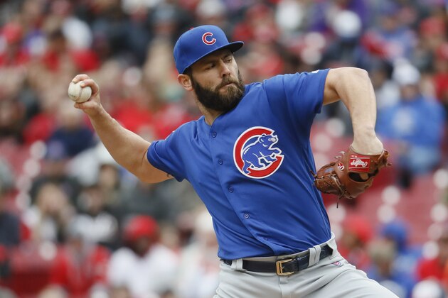 Chicago Cubs starting pitcher Jake Arrieta throws in the first inning of a baseball game against the Cincinnati Reds, Saturday, April 22, 2017, in Cincinnati. The Cubs won 12-8. (AP Photo/John Minchillo)