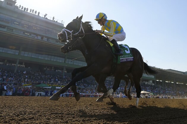 CORRECTS JOCKEY'S LAST NAME TO LEPAROUX, INSTEAD OF VELASQUEZ - Classic Empire, with jockey Julien Leparoux, wins the Breeders' Cup Juvenile horse race at Santa Anita, Saturday, Nov. 5, 2016, in Arcadia, Calif. (AP Photo/Mark J. Terrill)