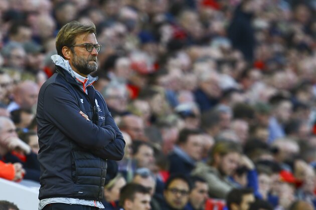 Liverpool's German manager Jurgen Klopp gestures on the touchline during the English Premier League football match between Liverpool and Crystal Palace at Anfield in Liverpool, north west England on April 23, 2017. / AFP PHOTO / Geoff CADDICK / RESTRICTED TO EDITORIAL USE. No use with unauthorized audio, video, data, fixture lists, club/league logos or 'live' services. Online in-match use limited to 75 images, no video emulation. No use in betting, games or single club/league/player publications.  /         (Photo credit should read GEOFF CADDICK/AFP/Getty Images)