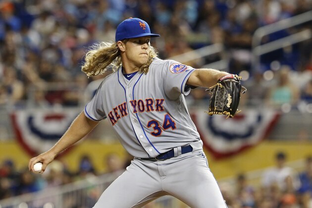 MIAMI, FL - APRIL 14:   Noah Syndergaard #34 of the New York Mets throws in the first inning against the Miami Marlins at Marlins Park on April 14, 2017 in Miami, Florida. (Photo by Joe Skipper/Getty Images)