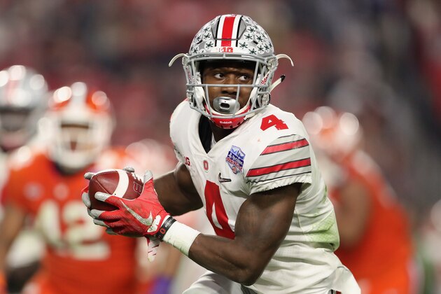 GLENDALE, AZ - DECEMBER 31:  Running back Curtis Samuel #4 of the Ohio State Buckeyes rushes the football against the Clemson Tigers during the Playstation Fiesta Bowl at University of Phoenix Stadium on December 31, 2016 in Glendale, Arizona. The Tigers defeated the Buckeyes 31-0.  (Photo by Christian Petersen/Getty Images)