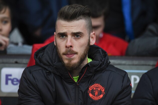 Manchester United's Spanish goalkeeper David de Gea sits on the bench before the UEFA Europa League quarter-final second leg football match between Manchester United and Anderlecht at Old Trafford in Manchester, north west England, on April 20, 2017. / AFP PHOTO / Oli SCARFF        (Photo credit should read OLI SCARFF/AFP/Getty Images)