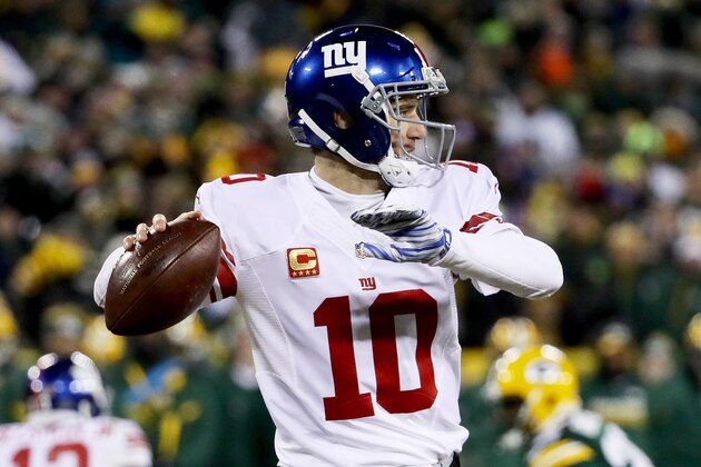 GREEN BAY, WI - JANUARY 8:  Eli Manning #10 of the New York Giants throws a pass in the fourth quarter during the NFC Wild Card game against the Green Bay Packers at Lambeau Field on January 8, 2017 in Green Bay, Wisconsin. (Photo by Jonathan Daniel/Getty Images)