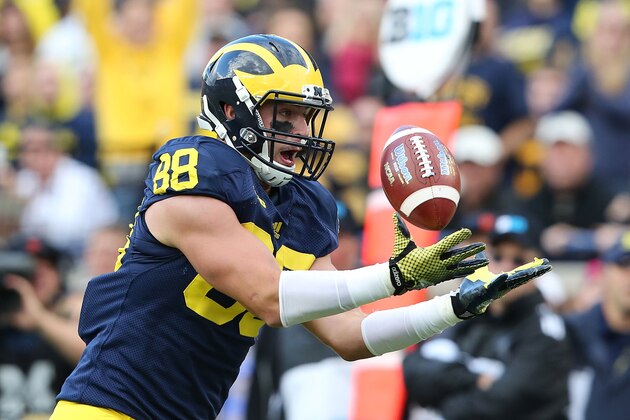 ANN ARBOR, MI - SEPTEMBER 13: Jake Butt #88 of the Michigan Wolverines catches a 29 yard pass for a third quarter touchdown during the game against the Miami University Redhawks at Michigan Stadium on September 13, 2014 in Ann Arbor, Michigan. the Wolverines defeated the Redhawks 34-10. (Photo by Leon Halip/Getty Images)