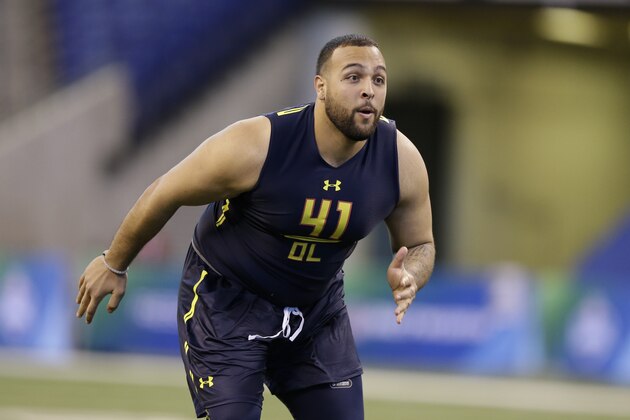 San Diego State offensive lineman Nico Siragusa runs a drill at the NFL football scouting combine in Indianapolis, Friday, March 3, 2017. (AP Photo/Michael Conroy)