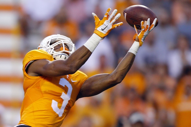 Tennessee wide receiver Josh Malone (3) can't hold onto the ball during the first half of an NCAA college football game against Western Carolina on Saturday, Sept. 19, 2015, in Knoxville, Tenn. (AP Photo/Wade Payne)