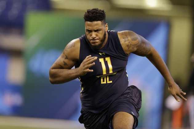 Bucknell offensive lineman Julie'N Davenport runs a drill at the NFL football scouting combine in Indianapolis, Friday, March 3, 2017. (AP Photo/Michael Conroy)